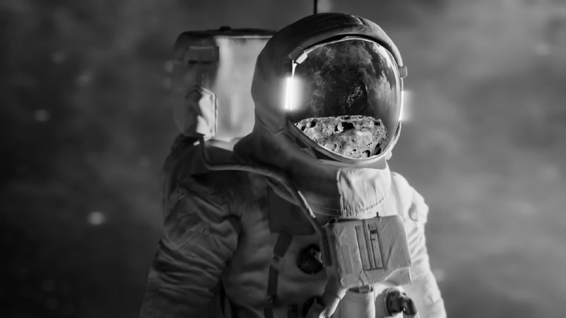 Astronaut, der auf die Erde schaut